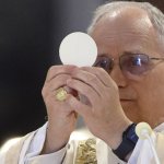 Pope Leo Holding Up Image