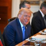 Trump at WH dinner Orange Face
