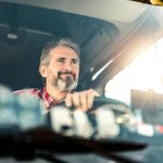 Driver smiling smugly meme
