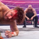 jon moxley watching hangman adam page suffer
