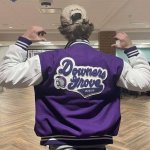 Pointing at back of Letterman jacket