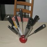 multiple knives on an apple template
