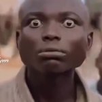 African man staring and nodding GIF Template