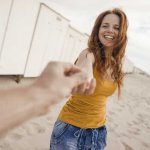 woman holding hand