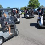Golf carts leaving