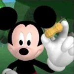 Mickey Holding a Peanut