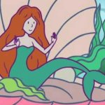 mermaid sitting