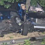 violent car wreck, toyota PU wrapped around tree