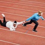 Man Dragging Woman Track