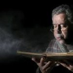 Blowing dust off book guy