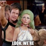 Look, we're on the Jumbotron | LOOK, WE'RE ON THE JUMBOTRON | image tagged in kirk and green hair lady,coldplay,jumbotron,oh wow are you actually reading these tags | made w/ Imgflip meme maker