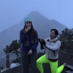 The earth moved... | Man proposed,
Volcano erupted | image tagged in gifs,memorable,proposal,volcano,coincidence,surprise | made w/ Imgflip video-to-gif maker
