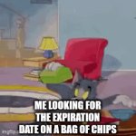 It takes me a hot minute to find it | ME LOOKING FOR THE EXPIRATION DATE ON A BAG OF CHIPS | image tagged in gifs,chips,relatable | made w/ Imgflip video-to-gif maker