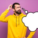 man-with-yellow-sweatshirt-having-doubts