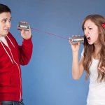 Yelling through tin cans