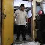Prabowo at a door