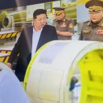 Kim Jong Un looking at things meme