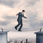 man walking on rope