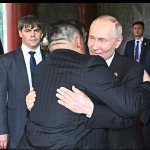 Putin and Kim hug