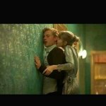 Girl pushing guy to the wall