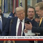 Donald Trump Checks Out Phone
