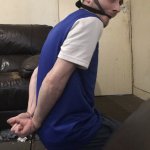 Mark tied up and gagged with his socks
