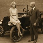 Henry Ford presenting a beautiful blonde girl in her 20s on top
