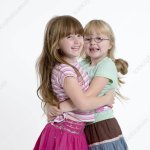Little girls hugging