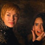 Cersei holding Ellaria's face as she watches her daughter Tyene