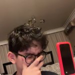 Kid Holding Flip Phone Crying