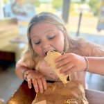 fat kid eating taco