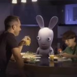 Rabbid having dinner with people