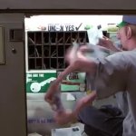 Man in Black Mail Sorting Alien GIF Template