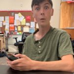 Green shirt guy surprised