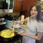 Girl Cooking Lettuce