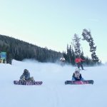 Sitting Snowboarders