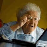 Old lady looking at computer