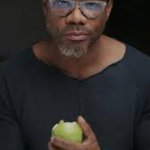 Guy eating apple