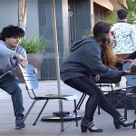 pulling chair from under someone