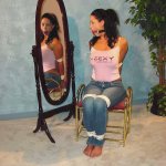 Tied up looking at mirror