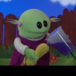 Puppet pouring juice into bird mouth