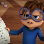 Simon holding a test he failed