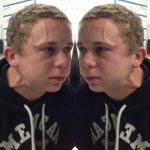 two boys staring intensely at each other