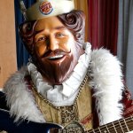 Burger King mascot on guitar