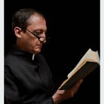 Priest reading
