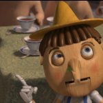 Pinocchio in Shrek being interrogated