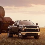 Truck Towing A Trailer With Hay Bales In It meme