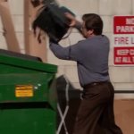 guy throwing pc in trash