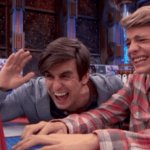 Two guys laughing at computor