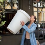 lady drinking big coffee